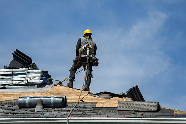 Professional Roof Replacement technician working in Jewett City, CT